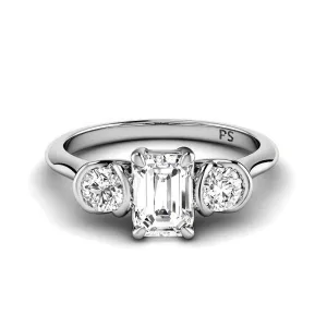 0.80 CT Round & Emerald Cut Diamonds - Three Stone Ring