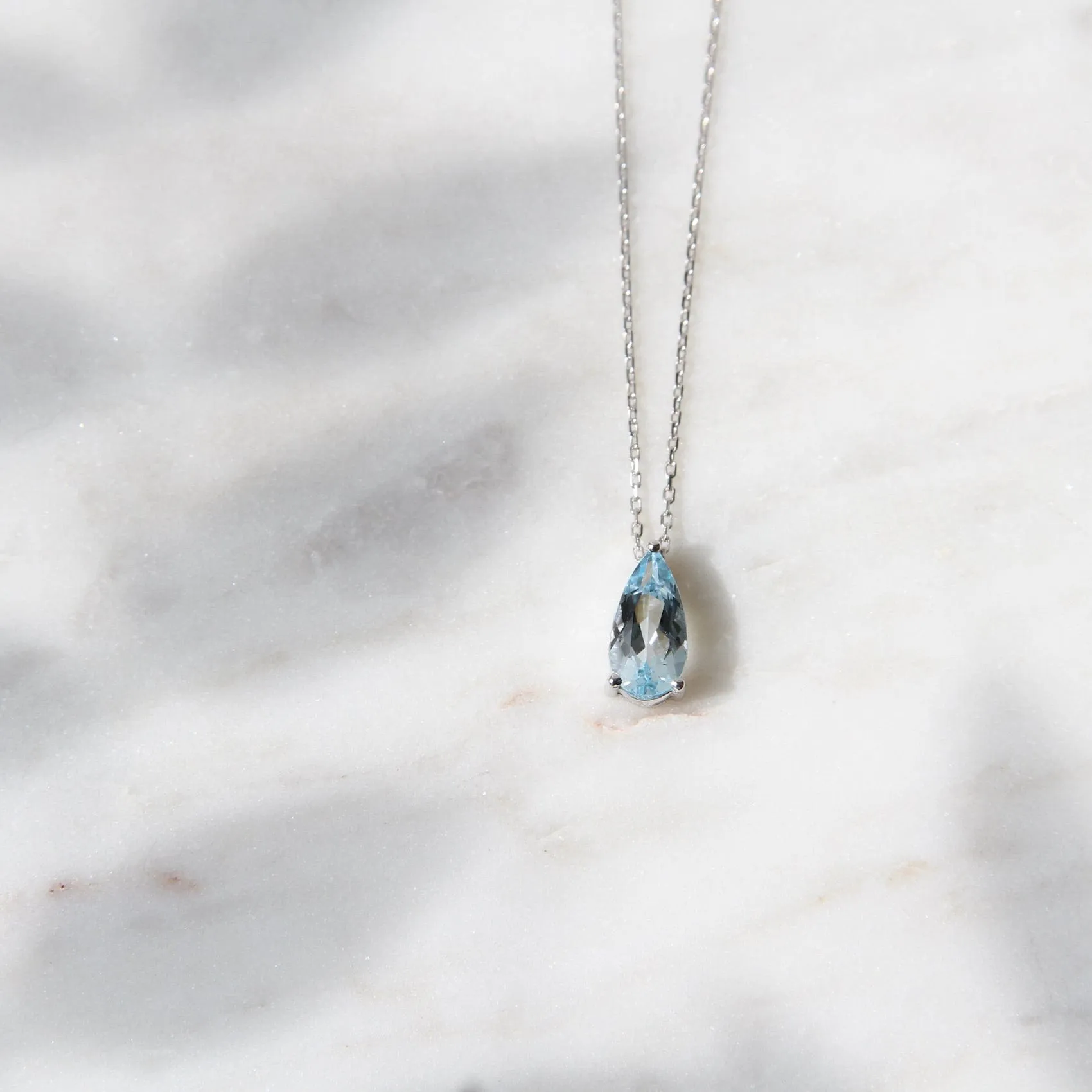 14k White Gold Pear Shaped Blue Topaz Necklace