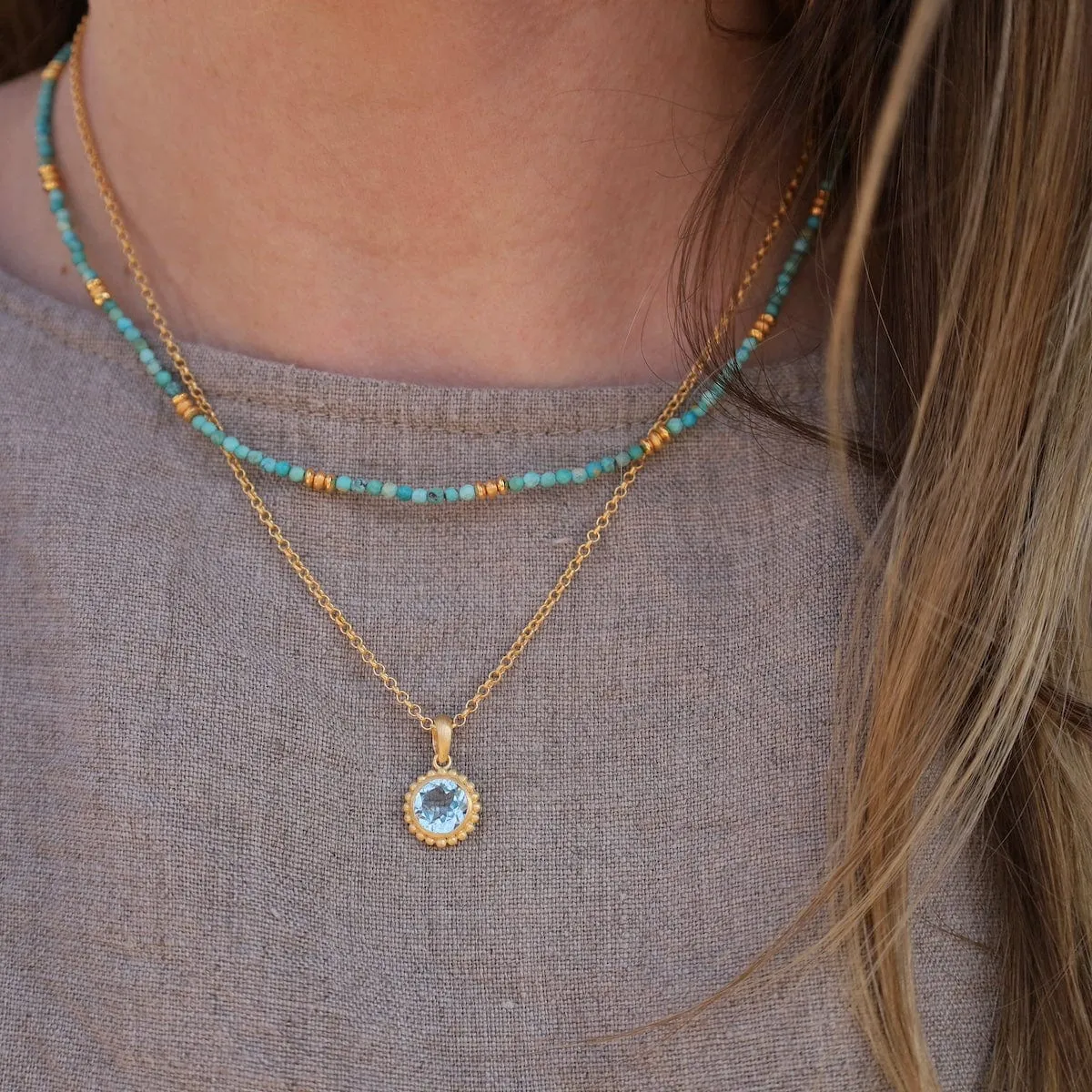 Karma Blue Topaz Pendant Necklace